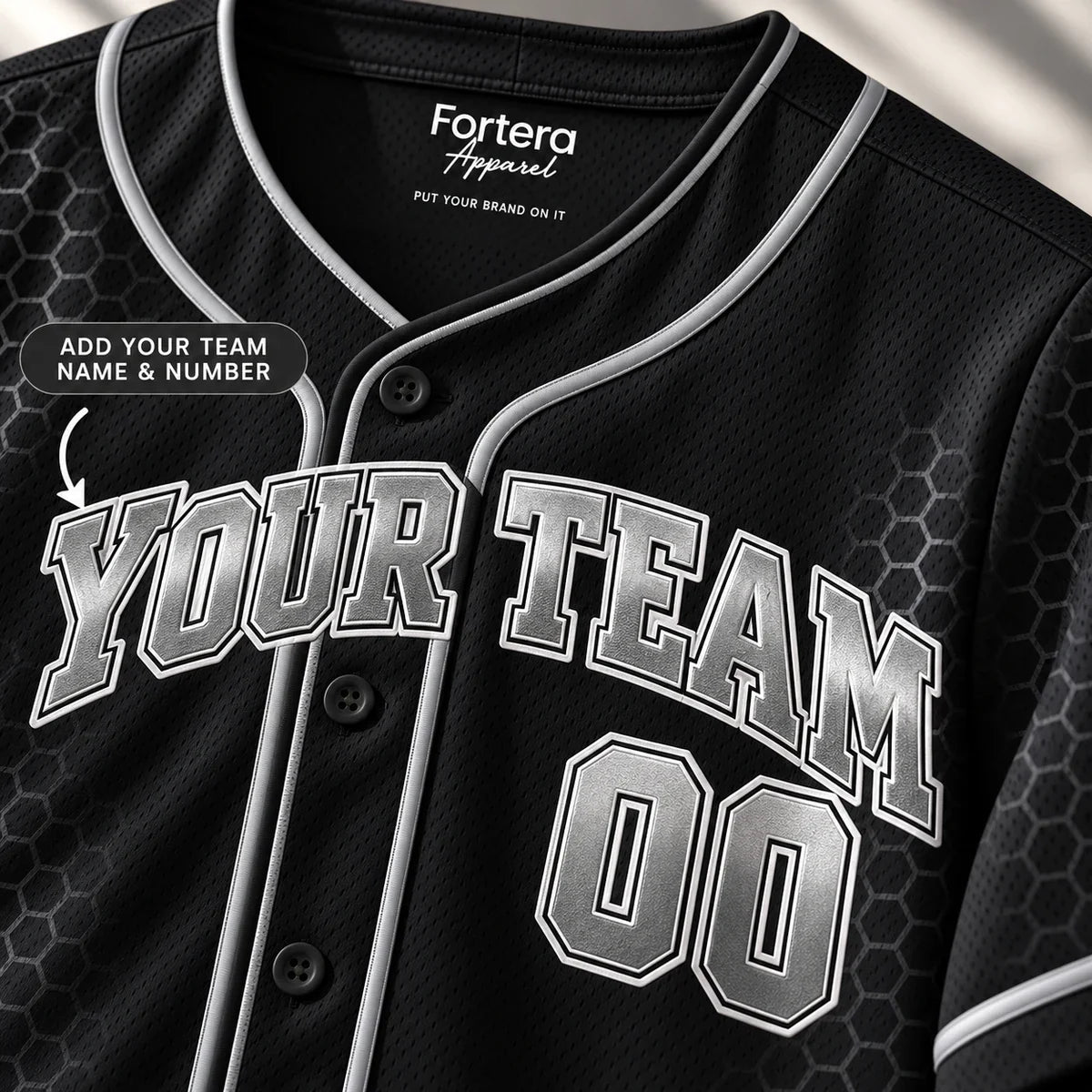 Close-up of the Blackout Chrome black baseball jersey lettering and piping