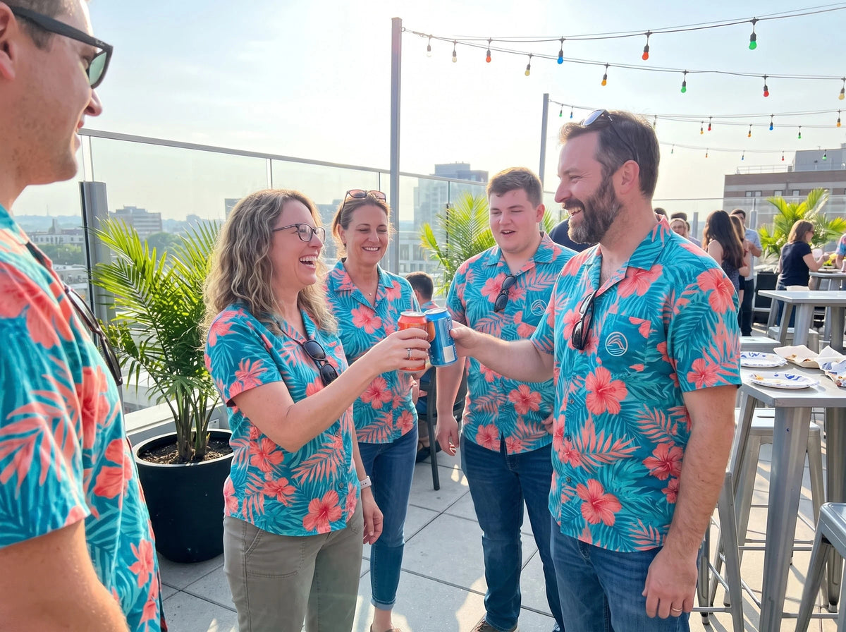 Coworkers wearing matching branded Hawaiian shirts at a company summer party