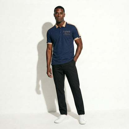 Navy bulk embroidered polo shirt with tan gold shoulder panel detail - detail close-up