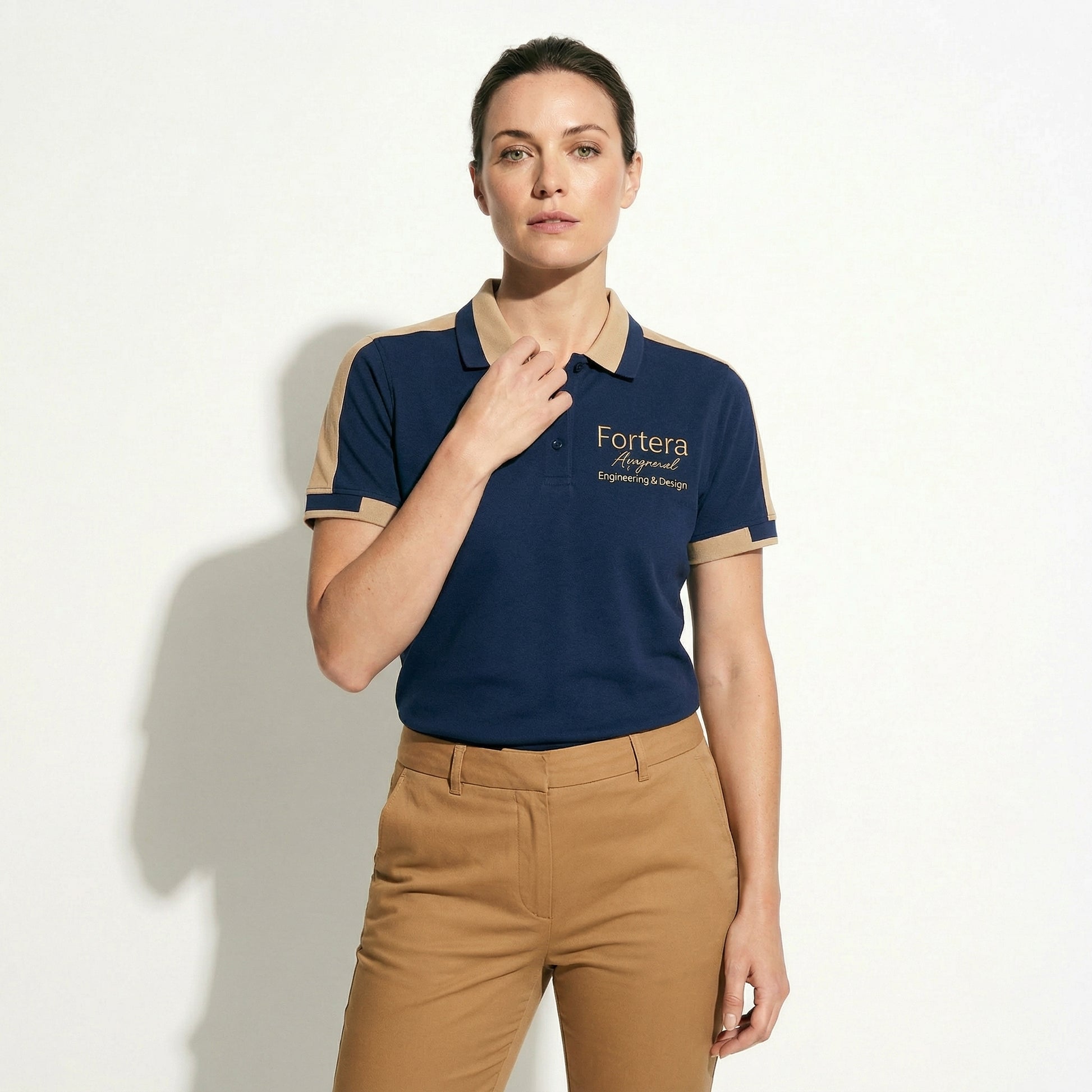 Navy bulk embroidered polo shirt with tan gold shoulder panel detail - female fit
