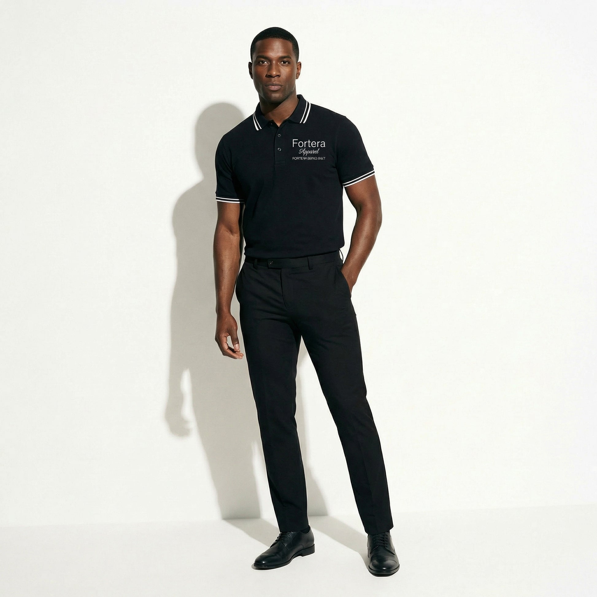All black classic polo shirt with white tipping on collar and cuffs - female fit