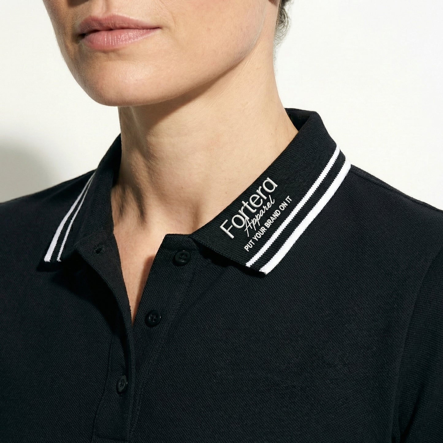 All black classic polo shirt with white tipping on collar and cuffs - logo embroidery detail
