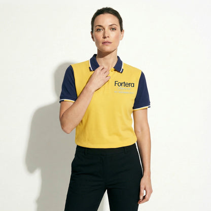 Yellow custom business polo shirt with navy shoulder panel and embroidered logo - detail close-up