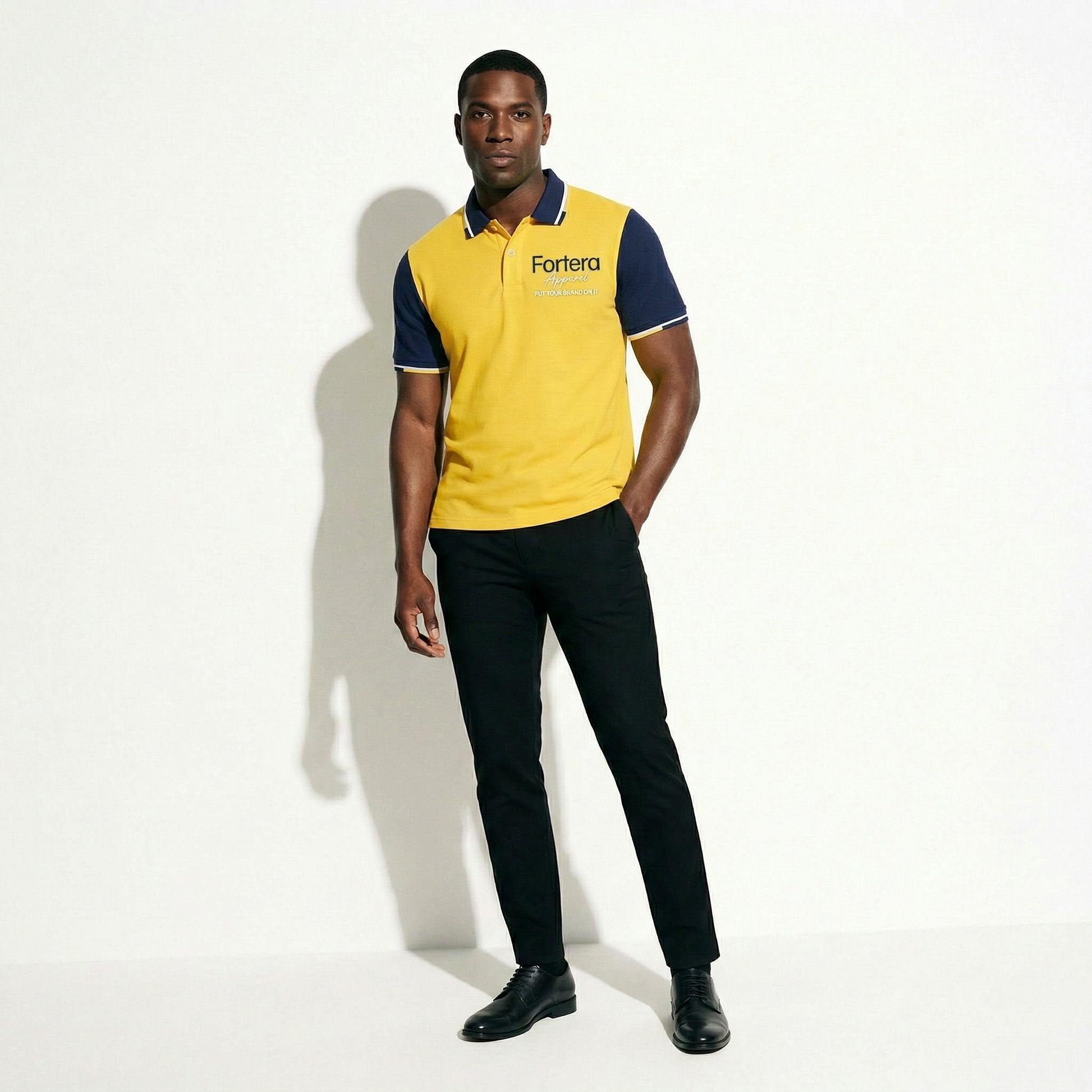Yellow custom business polo shirt with navy shoulder panel and embroidered logo - female fit