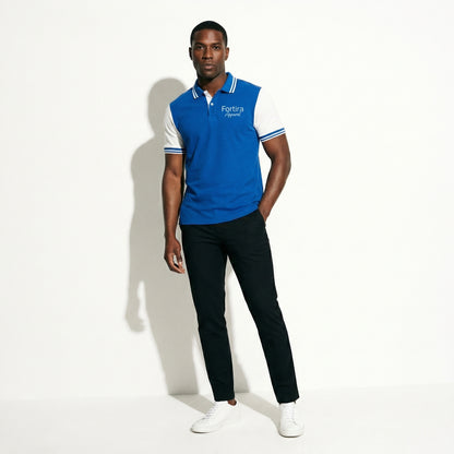 Royal blue custom staff polo shirt with white side panel and embroidered logo - female fit