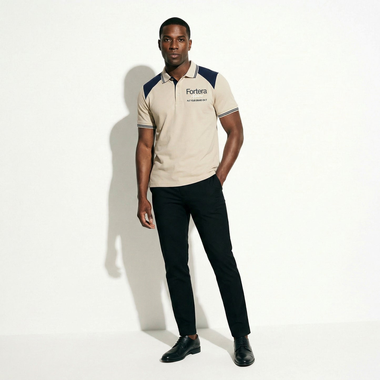 Beige embroidered polo shirt with navy yoke panel across shoulders - female fit