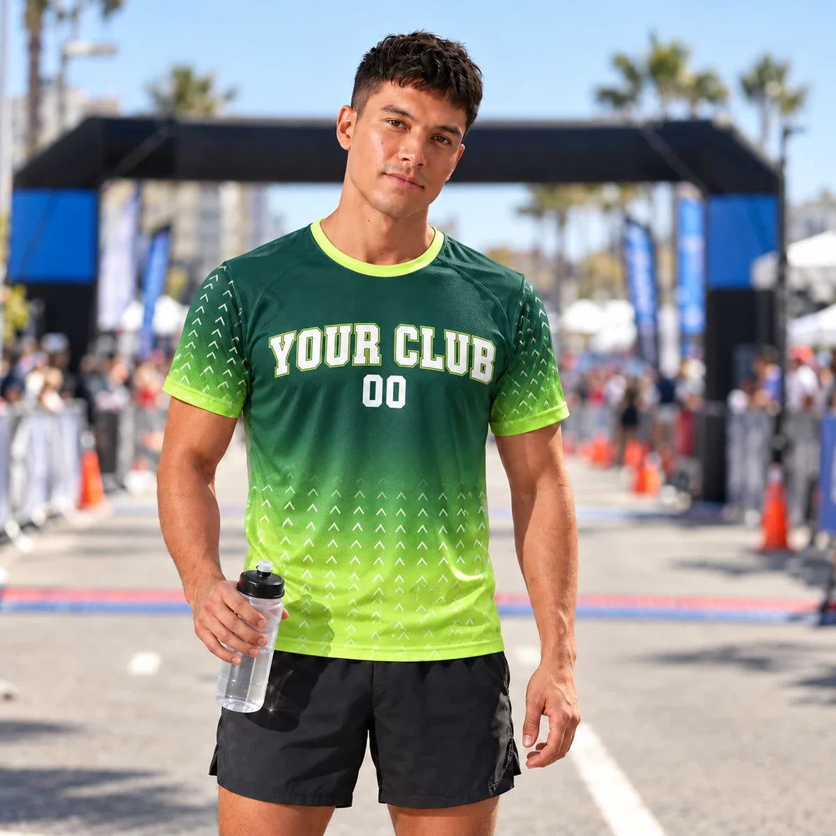 Runner wearing the Forest Gradient Green Running Shirt at a race finish line