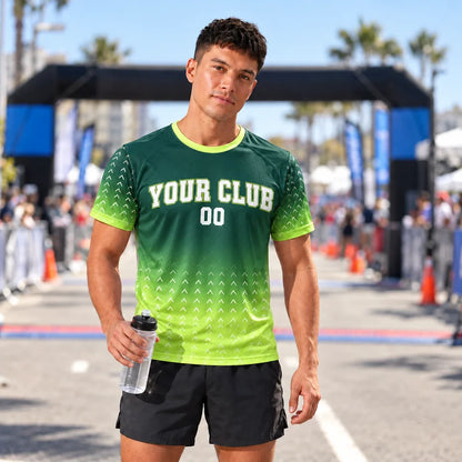 Runner wearing the Forest Gradient Green Running Shirt at a race finish line