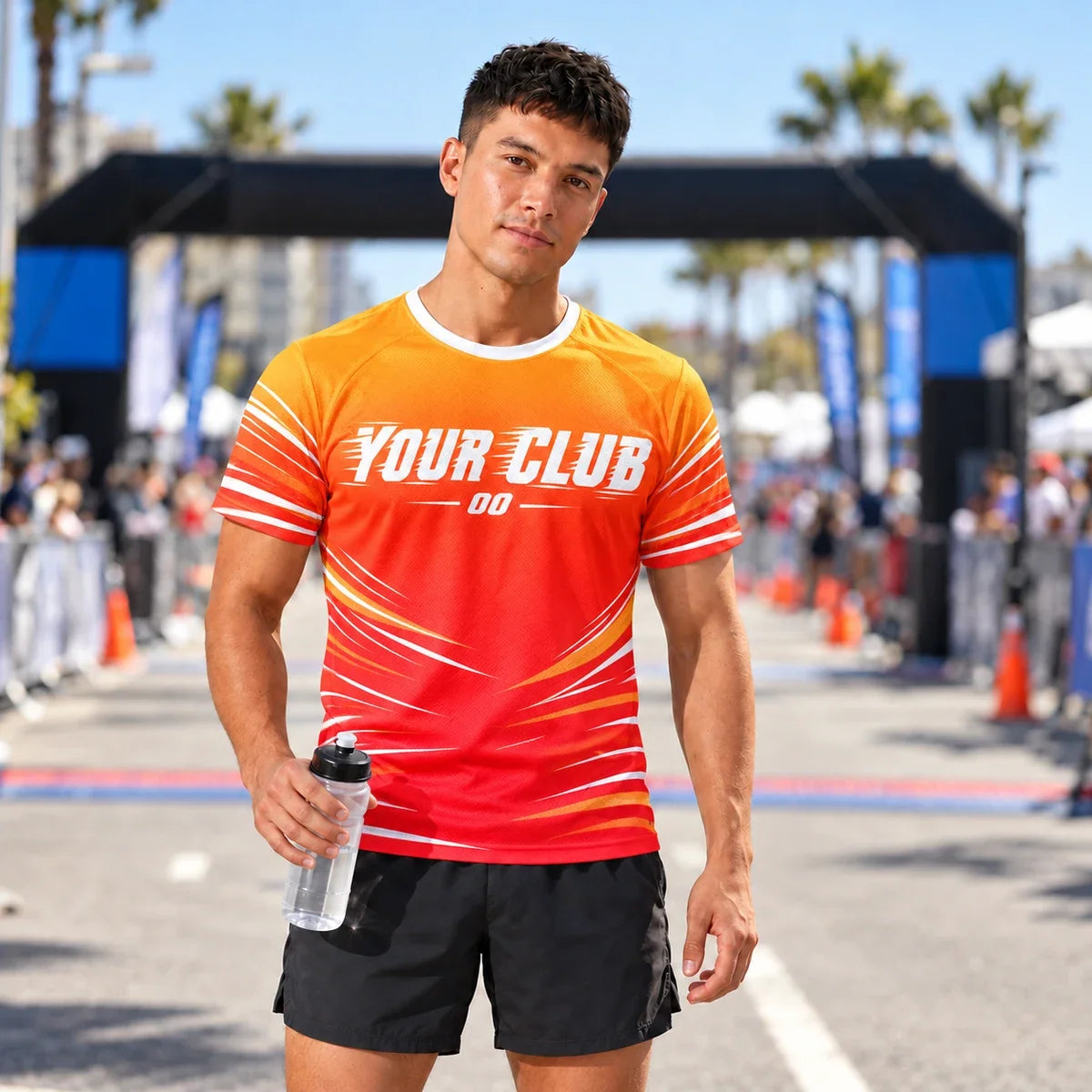 Runner wearing the Heatwave Orange Running Shirt at a race finish line