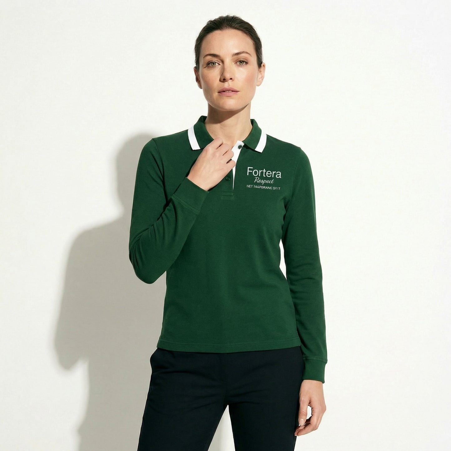 Forest green long sleeve polo shirt with white collar tipping and embroidered logo - detail close-up