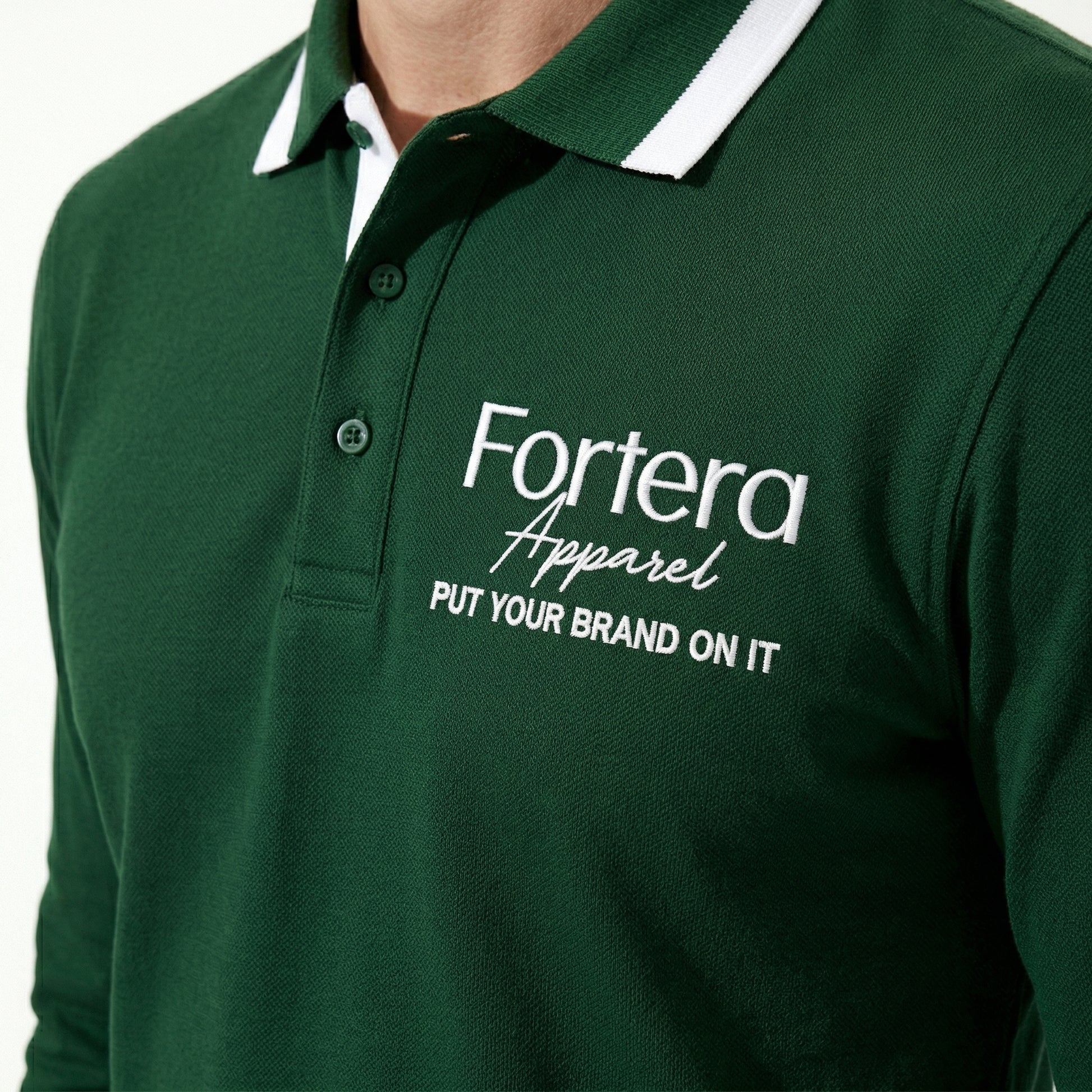 Forest green long sleeve polo shirt with white collar tipping and embroidered logo - male fit