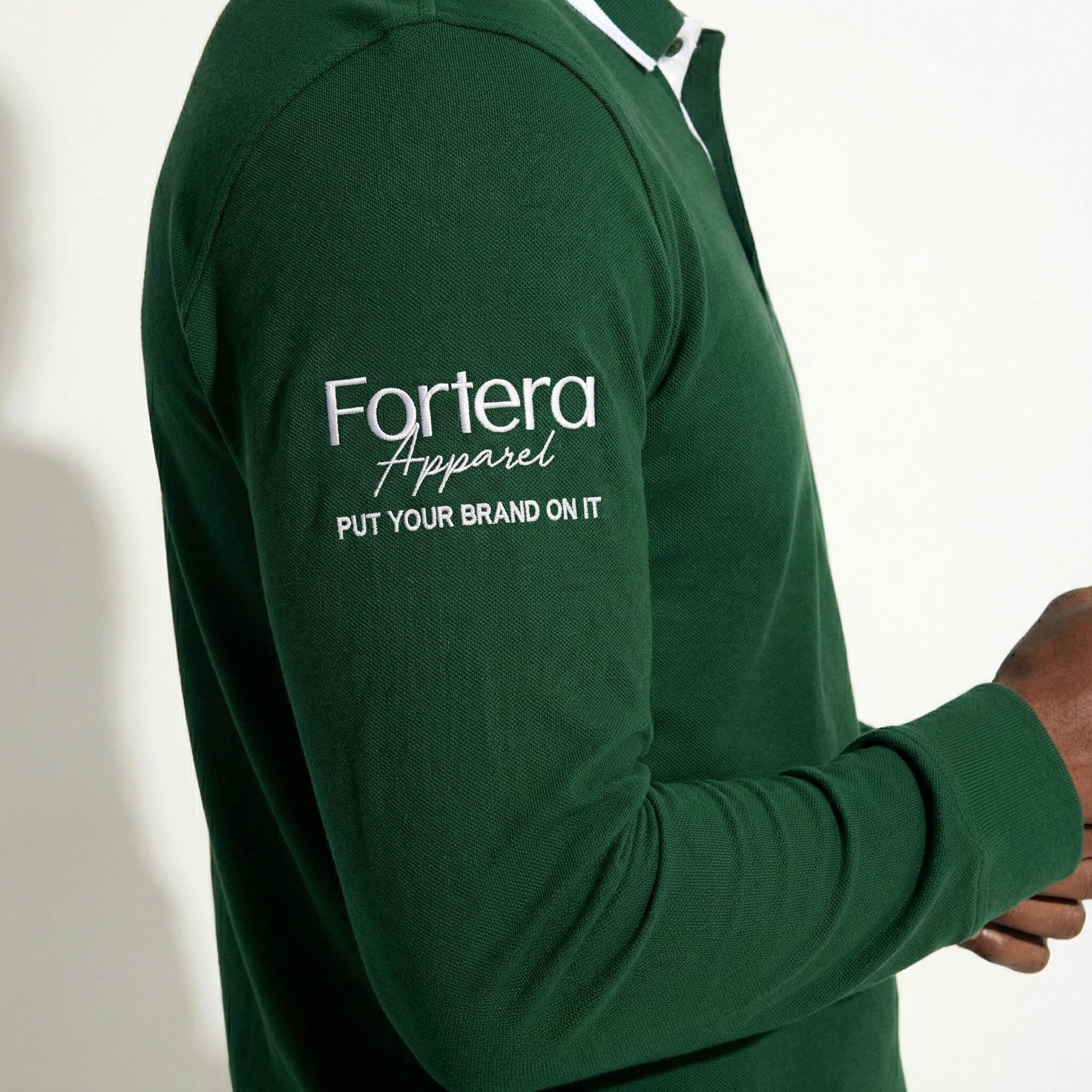 Forest green long sleeve polo shirt with white collar tipping and embroidered logo - team uniform group