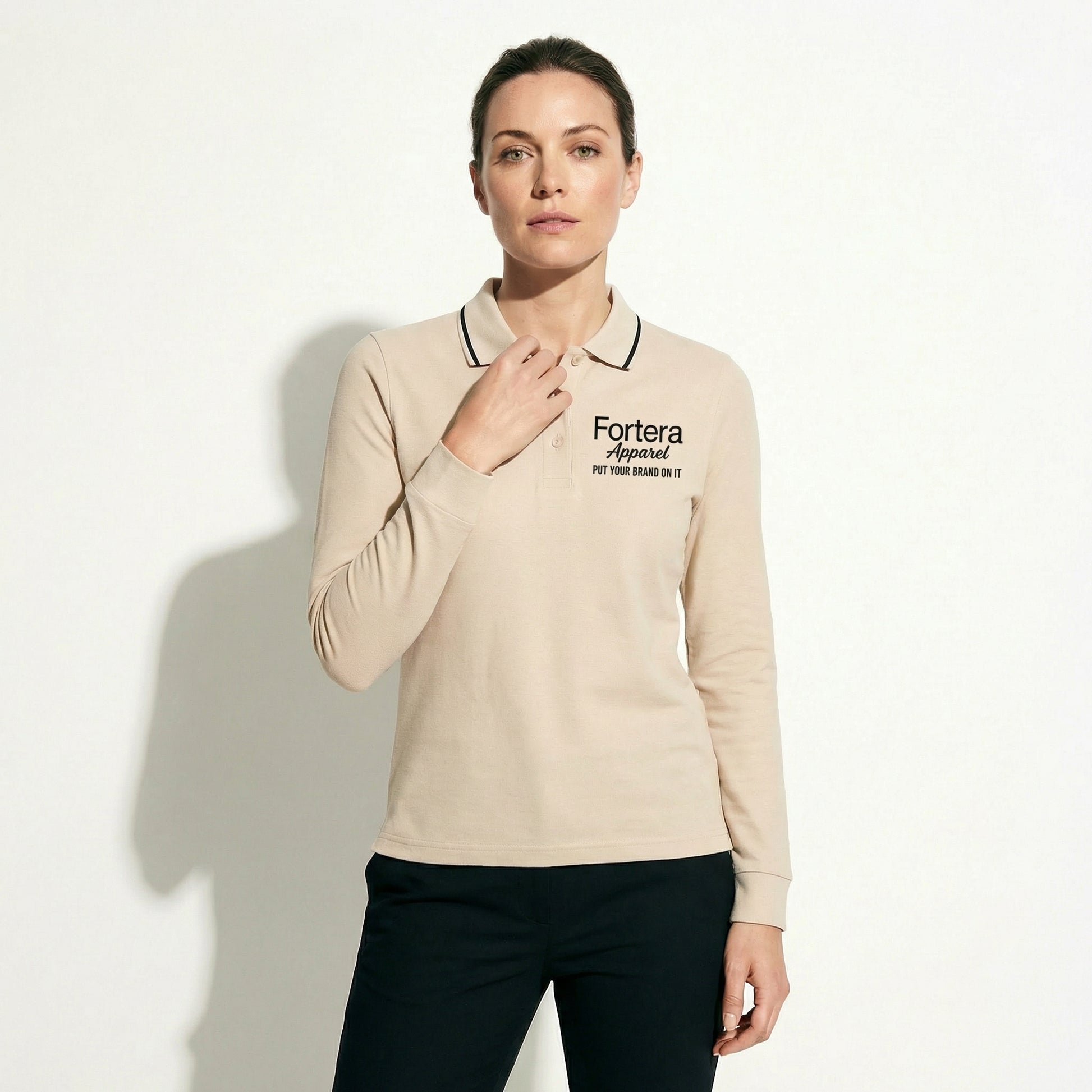 Beige long sleeve work polo shirt with embroidered logo and dark contrast tipping - detail close-up