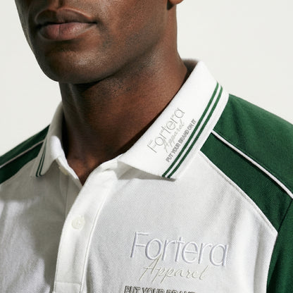 White moisture wicking polo uniform with forest green two-tone shoulder panel - team uniform group