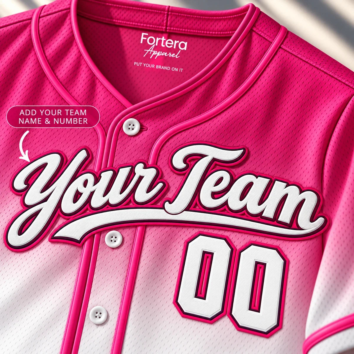 Close-up of the Pink Fade pink baseball jersey lettering and piping