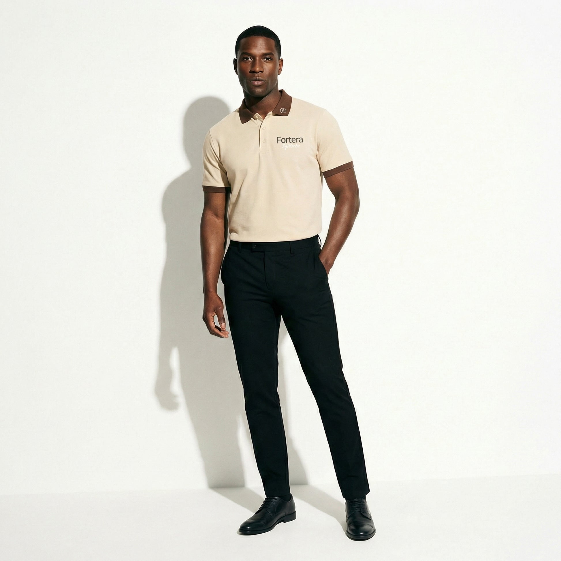 Beige polo shirt with company logo and dark brown contrast tipping on collar and cuffs - female fit