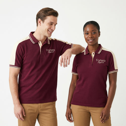 Burgundy polo shirt with company logo and cream shoulder panel accent - side view