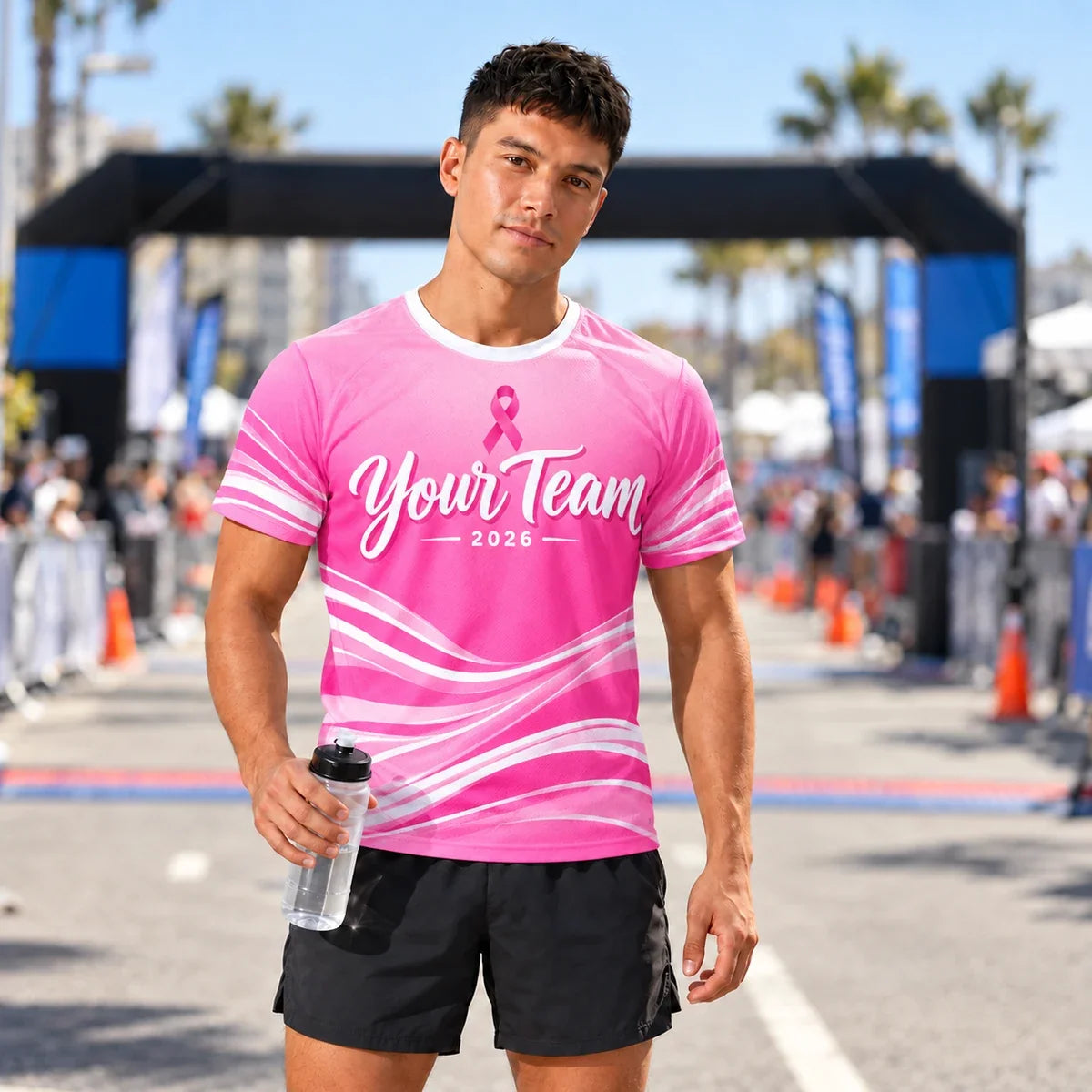 Runner wearing the Ribbon Pace Pink Running Shirt at a race finish line