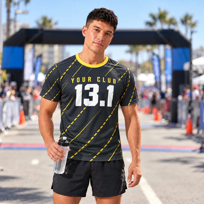 Runner wearing the Road Lines Half Marathon Shirt at a race finish line