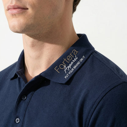 Solid navy custom embroidered polo shirt clean minimal design - logo embroidery detail