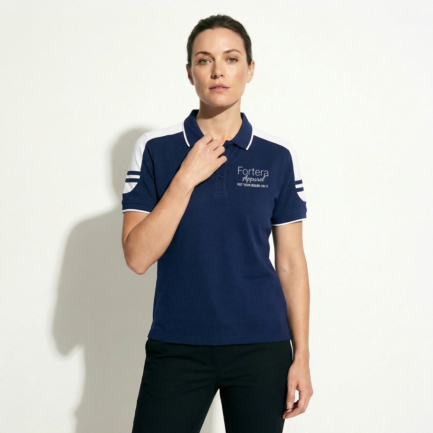 Navy work polo shirt with embroidered logo and white shoulder block panel - female fit