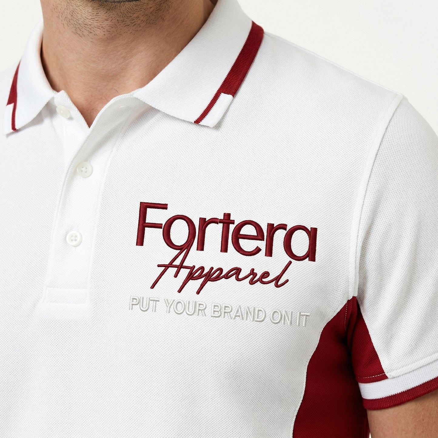 White work polo shirt with embroidered logo and red side panel - male fit