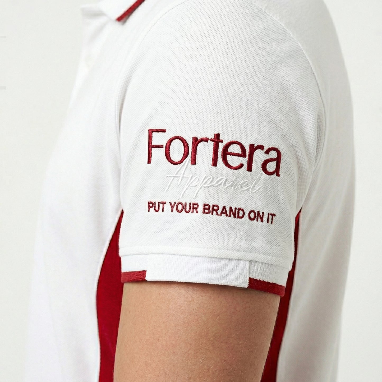 White work polo shirt with embroidered logo and red side panel - team uniform group