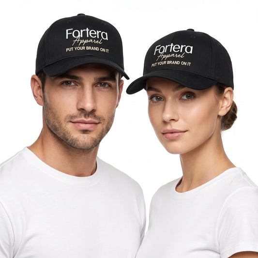 Young couple wearing matching black custom embroidered baseball caps with Fortera Apparel logo on front panels